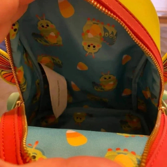 Heimlich Loungefly Backpack and leaf wallet